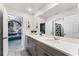Bathroom featuring double sinks, white countertop, and tile flooring, with a view of the Star Wars themed bedroom at 1799 Tropical Palms Cir, Kissimmee, FL 34747