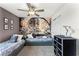 The bedroom features twin beds and a Star Wars themed wall mural at 1799 Tropical Palms Cir, Kissimmee, FL 34747