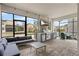Screened outdoor kitchen with built in grill, stainless steel appliances, and seating at 1799 Tropical Palms Cir, Kissimmee, FL 34747