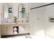 Spa-like bathroom with double vanity sinks, soaking tub, and an elegant glass shower at 1803 Florinda Dr, Orlando, FL 32804