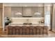 Modern kitchen with large island, stylish pendant lighting, and stainless steel appliances at 1803 Florinda Dr, Orlando, FL 32804