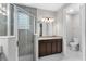 Bathroom with an enclosed shower, a vanity, and a toilet in a separate room at 193 Old Moss Cir, Deland, FL 32724