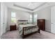 Inviting bedroom featuring a ceiling fan, neutral color palette and bright windows at 193 Old Moss Cir, Deland, FL 32724