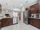 Open concept kitchen featuring stainless appliances, granite countertops and sleek cabinetry at 193 Old Moss Cir, Deland, FL 32724