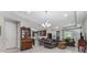 Open floor plan combining living room with kitchen with sleek decor and lots of light at 193 Old Moss Cir, Deland, FL 32724