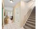 Entryway features a staircase to the second floor and a doorway leading to the living area at 208 Hideaway Ct, Minneola, FL 34715