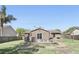 A backyard view shows the deck and outdoor grill at 2098 Hedgerow Cir, Ocoee, FL 34761