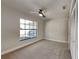This bedroom features a neutral color scheme, carpet and closet at 213 Almaden Ct, Winter Springs, FL 32708