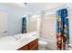 Bathroom with Paw Patrol themed shower curtain and vanity at 2359 Baronsmede Ct, Winter Garden, FL 34787