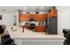 Well-equipped kitchen with stainless steel appliances, breakfast bar, and ample counter space at 2359 Baronsmede Ct, Winter Garden, FL 34787