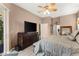 Spacious main bedroom with a large dresser, walk in closet, and sliding door to the outside at 2359 Baronsmede Ct, Winter Garden, FL 34787