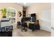 Home office area with hardwood floors, natural light, and neutral colors at 2359 Baronsmede Ct, Winter Garden, FL 34787