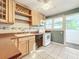 This kitchen features natural light from a window over the sink and stainless appliances at 2509 Formosa Ave, Orlando, FL 32804