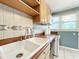 This kitchen features natural light from a window over the sink and stainless appliances at 2509 Formosa Ave, Orlando, FL 32804
