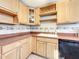 This kitchen features ample counter space, wood cabinets and modern appliances at 2509 Formosa Ave, Orlando, FL 32804