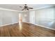 Living room features hardwood floors and neutral paint flowing into adjacent rooms at 2509 Formosa Ave, Orlando, FL 32804
