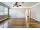 Spacious living room features hardwood floors, many windows, and neutral paint at 2509 Formosa Ave, Orlando, FL 32804