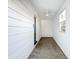 Enclosed porch with tile flooring, ceiling fan, and bright natural light at 2509 Formosa Ave, Orlando, FL 32804