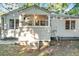 Exterior view of the back of the home featuring a screened porch at 2509 Formosa Ave, Orlando, FL 32804
