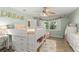 Whimsical bedroom with stylish bunk bed, ceiling fan and flower rug at 2922 Carmia Dr, Orlando, FL 32806