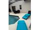 Outdoor pool area with patio seating, lounge chairs, and an open layout at 4573 Ada Ln, Kissimmee, FL 34746