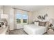 Inviting bedroom with soft textures and natural light at 4711 Coral Harbour Rd, Kissimmee, FL 34758