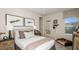 Nicely decorated bedroom featuring a comfortable bed and natural lighting at 4711 Coral Harbour Rd, Kissimmee, FL 34758