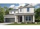 Inviting two-story home featuring a covered entryway, two-car garage, and manicured lawn at 4711 Coral Harbour Rd, Kissimmee, FL 34758