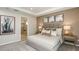 Comfortable bedroom featuring a large bed and ensuite bathroom at 4711 Coral Harbour Rd, Kissimmee, FL 34758