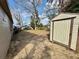 Large backyard with a storage shed at 701 N 4Th St, Haines City, FL 33844