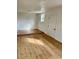 Living space with attractive flooring, a raised platform, fresh paint, and bright natural light at 701 N 4Th St, Haines City, FL 33844