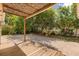 Relaxing backyard features a lattice-covered patio, wood deck, mature landscaping, and privacy fence at 704 Briarwood Dr, Winter Springs, FL 32708