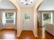 Welcoming foyer with hardwood floors, arched doorways, and a view of the living spaces at 718 31St St, Orlando, FL 32805