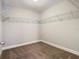 Spacious walk-in closet featuring carpeted floor and wire shelving for storage at 753 Sandy Bar Dr, Winter Garden, FL 34787