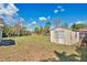 The backyard features a storage shed at 8703 Grandee Dr, Orlando, FL 32829