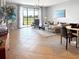 Bright living room with tile floors, a lake view, and modern decor at 8908 Azalea Sands Ln, Davenport, FL 33896