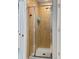 Clean and simple tiled shower with glass door at 8908 Azalea Sands Ln, Davenport, FL 33896