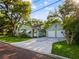 Charming home with a well-maintained lawn and a detached two-car garage at 1000 Elmwood St, Orlando, FL 32801
