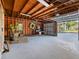 Spacious garage with exposed beams, concrete floors, and ample room for storage or a workshop at 1000 Elmwood St, Orlando, FL 32801