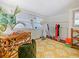 Bright office space with a patterned rug, vintage furniture and lots of natural light at 1000 Elmwood St, Orlando, FL 32801