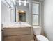Updated bathroom with a modern vanity, new lighting, and a neutral color scheme at 101 Sandpebble Pl, Sanford, FL 32771