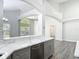Open kitchen design with ample counter space and modern appliances seamlessly connected to living area at 101 Sandpebble Pl, Sanford, FL 32771