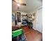 Well-organized room with bunk beds, a study area, hardwood floors, and themed decor at 12184 Aztec Rose Ln, Orlando, FL 32827