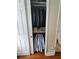 This closet features clothing racks, shelving, and hardwood floors at 12184 Aztec Rose Ln, Orlando, FL 32827