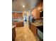 Well-lit kitchen featuring stainless steel appliances, granite counters and tile backsplash at 12184 Aztec Rose Ln, Orlando, FL 32827