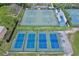 Aerial view of outdoor community basketball and pickleball courts, offering fun recreational activities at 12613 Maribou Cir, Orlando, FL 32828