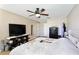 Bedroom with view of tv and closet features nice furnishings at 12613 Maribou Cir, Orlando, FL 32828