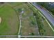 Aerial view of the dog park, where pets can play and socialize in a safe, enclosed environment at 12613 Maribou Cir, Orlando, FL 32828