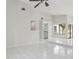 Open-concept living area showcasing tile floors, recessed lighting, and a wet bar at 1311 Harbour Dr, Longwood, FL 32750