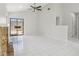 Open-concept living area showcasing tile floors, a stone fireplace, and access to outdoor space at 1311 Harbour Dr, Longwood, FL 32750